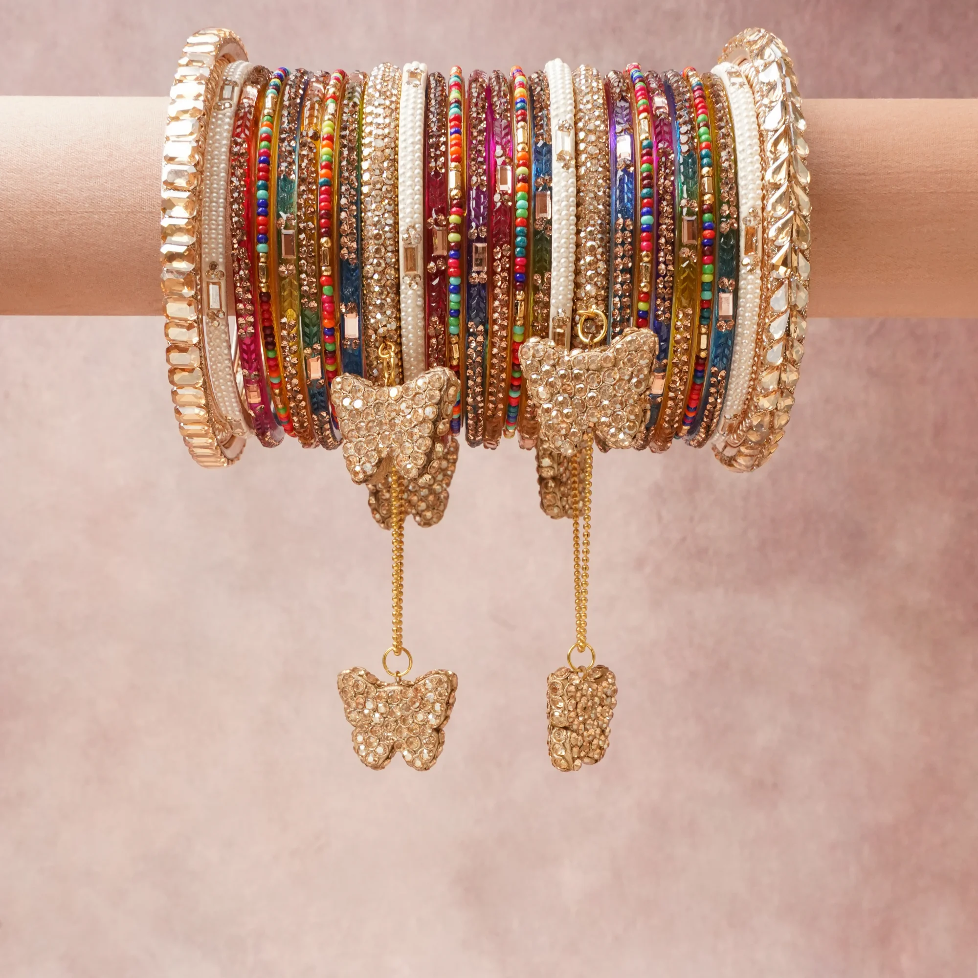 A majestic Multi colour set, complemented by Clear, White, Ruby Red, Emerald Green, Sapphire Blue, Amethyst Purple, Topaz Yellow, Turquoise, Carnelian Orange, Rose Pink, Jet Black featuring Gold-Toned Metal, Glass (Bangles, Seed Beads), Faux Pearls, Clear Rhinestones, Colored Glass Rhinestones.
Rich, ceremonial, and designed to be passed through generations.